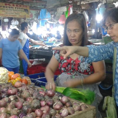 Women at outdoor food market