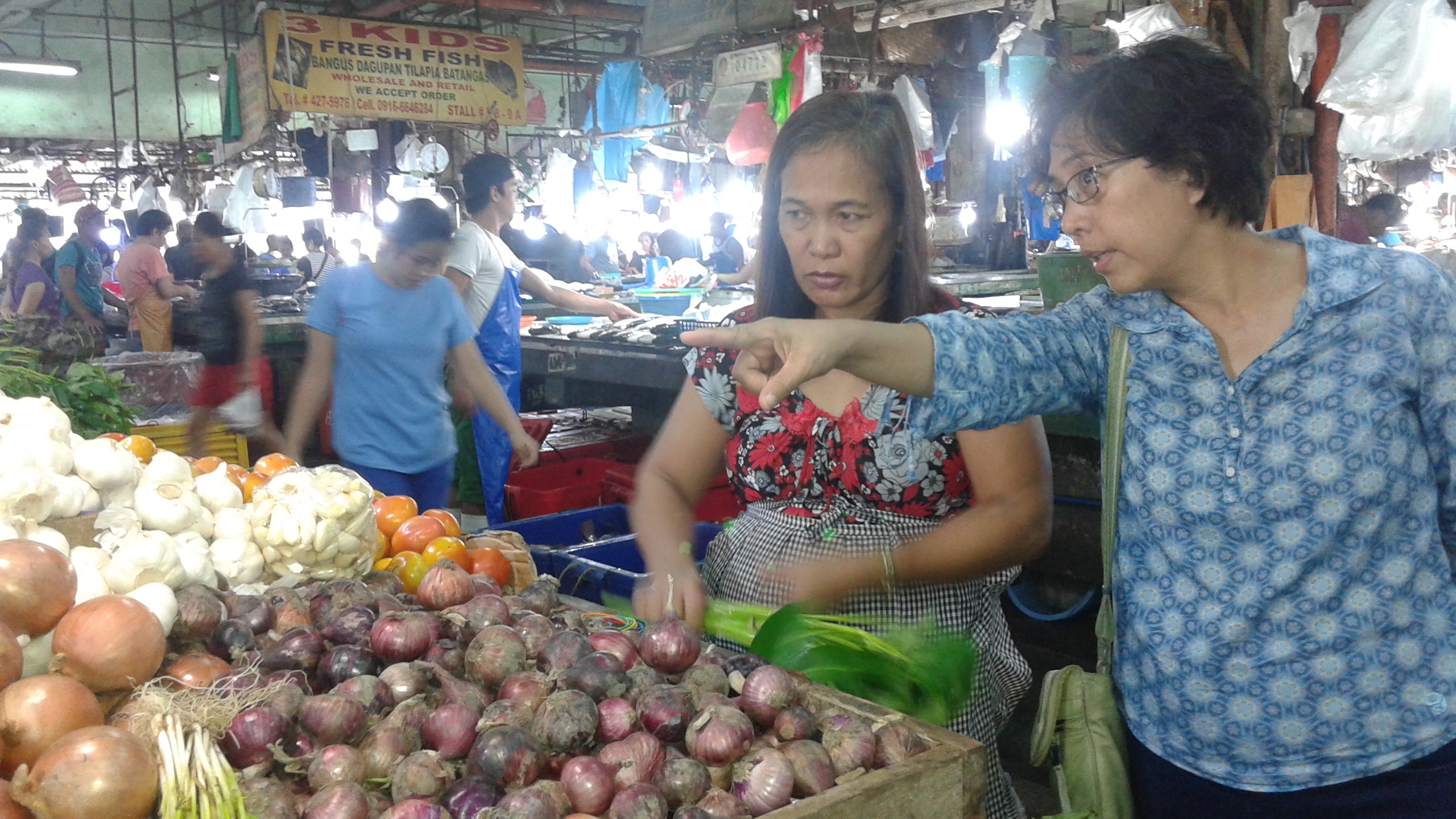 Women at outdoor food market