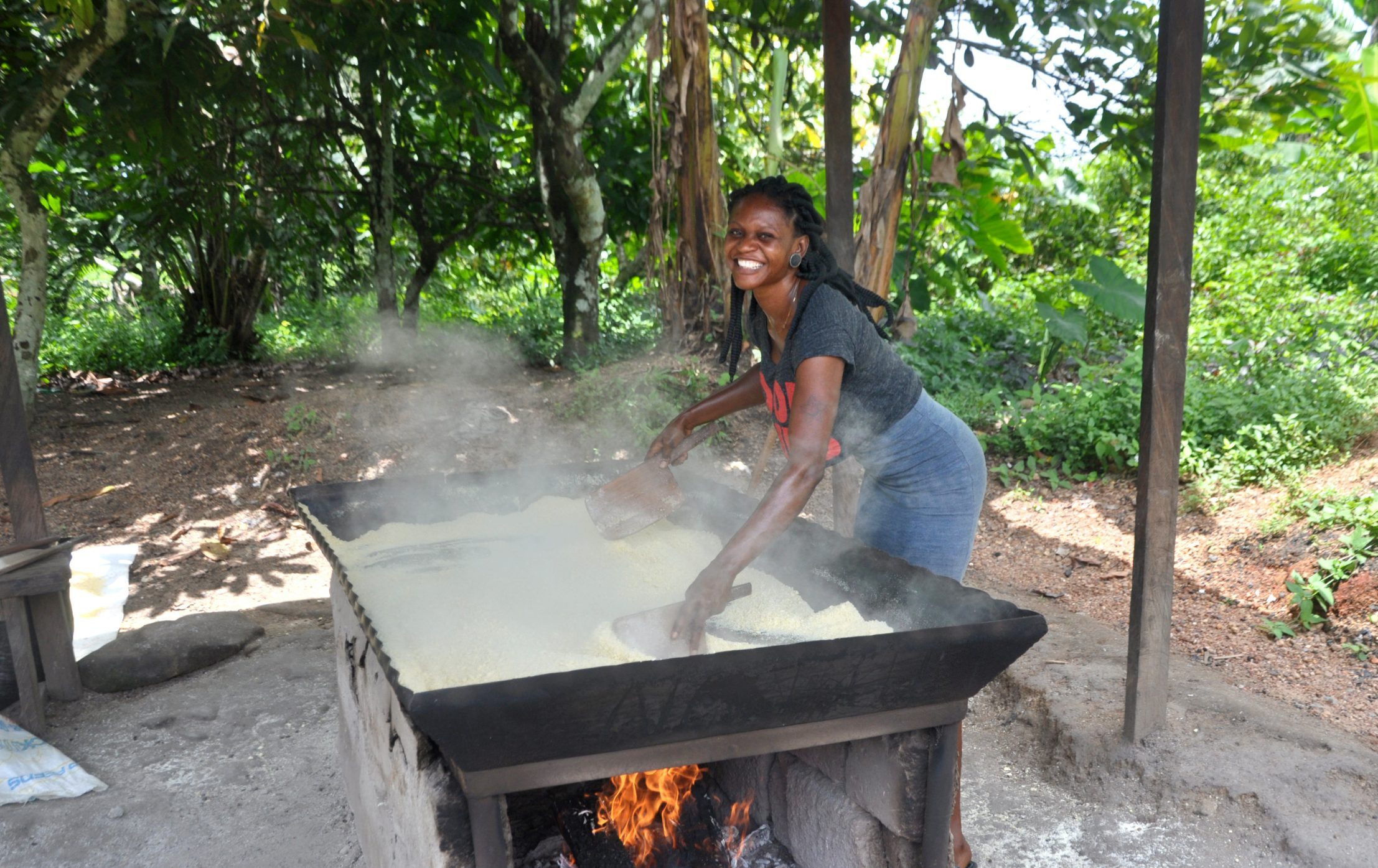 Woman working over a fire