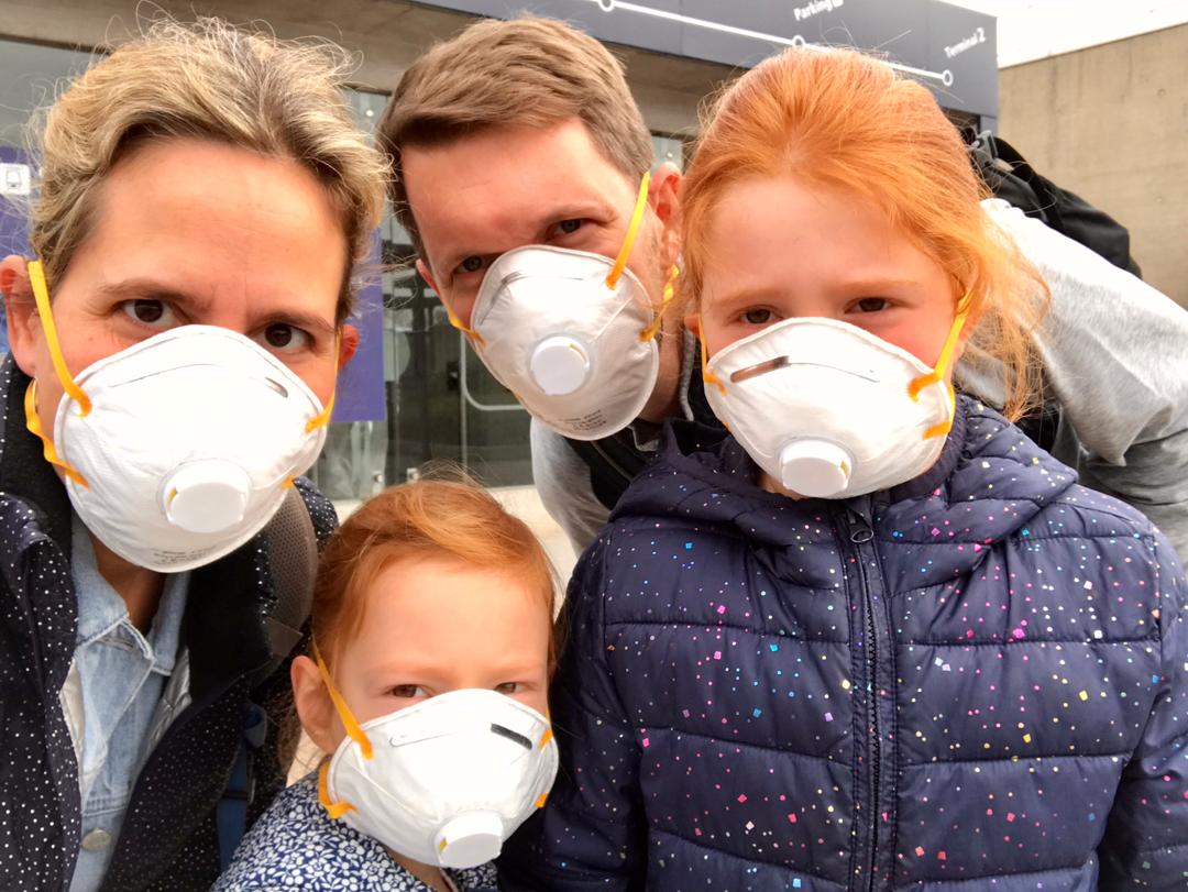 David Forest and his family wearing masks