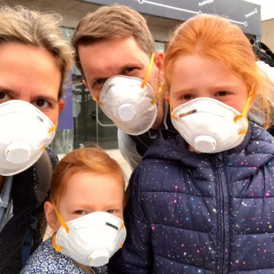 Family wearing face masks