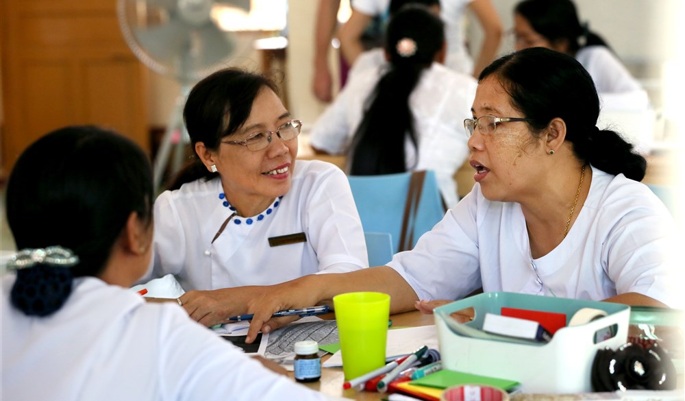 Women talking around table