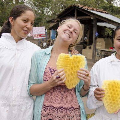 Women holding honeycomb