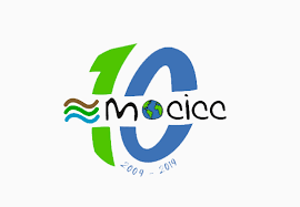 Logo with green and blue "10," wavy lines, MOICC text with globe in "o," and "2009 - 2019" below.