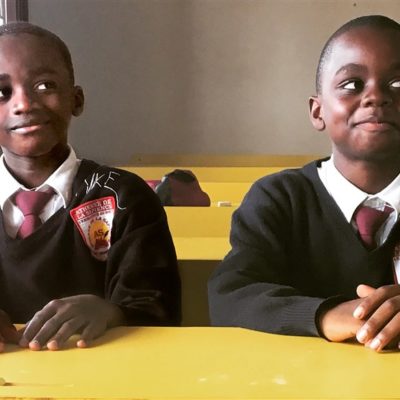 Two boys in school uniforms